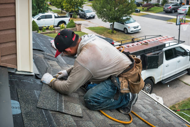 Professional Metal Roofing technician working in Webster, MA